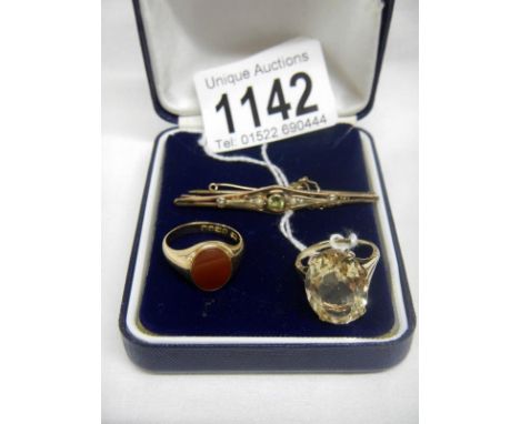 A citrine set 9ct gold ring, a peridot and pearl 9ct gold brooch and a cornelion set 9ct gold ring, approx total weight 12.75