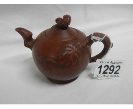 A miniature Chinese Yixing teapot, 19th century, stamped to base