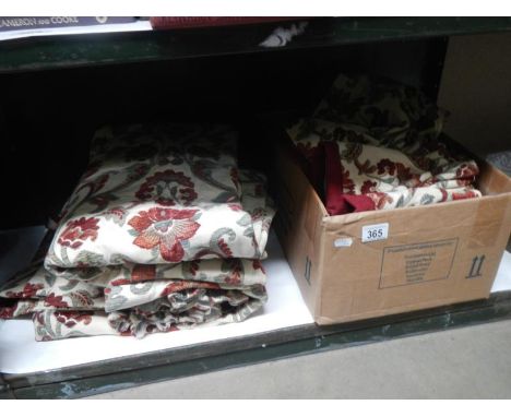 A pair of fully lined tapestry curtains with pelmet. Approximate width 49" approximate drop 64". (sun bleached on edge)
