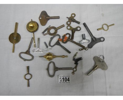 A quantity of antique clock keys etc