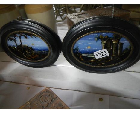 An unusual pair of pictures (22.5cm wide) made with etched mother of pearl and painted c.1900