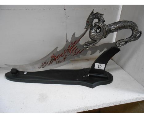 A Lord of the Rings sword on stand