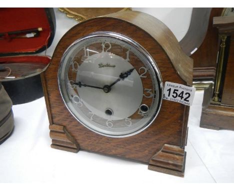 A Bentimo 3 hole oak mantel clock in working order