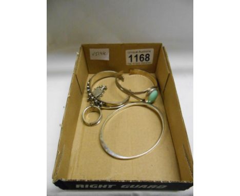 A silver bangle with attached ring and 2 silver bangles, all marked 925