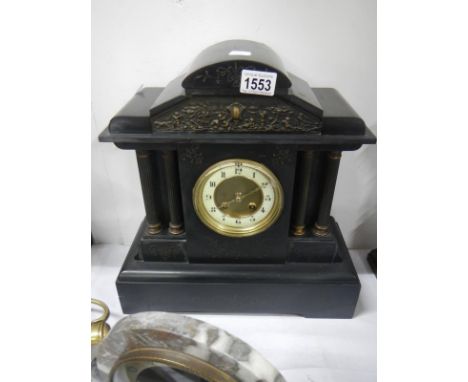 A black slate Paladian 4 pillar mantel clock