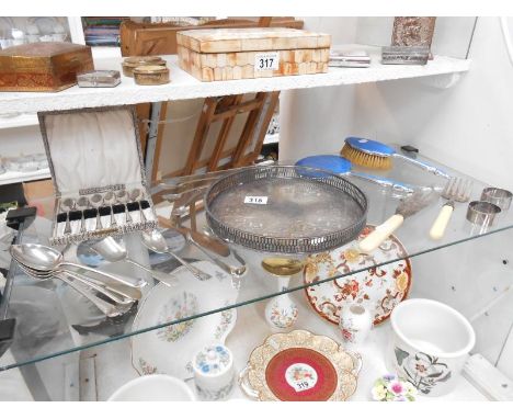 A quantity of silver plated items including enamel back mirror & brush etc.
