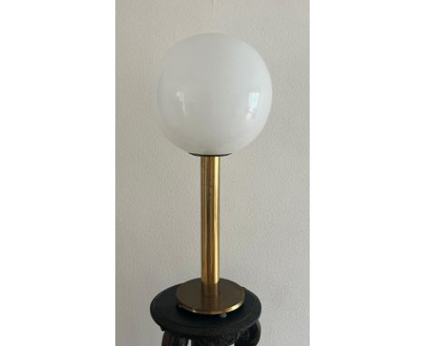 A 1970's brass and opaque glass ball lamp 80cm H
