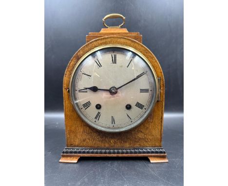 A George III style walnut bracket form mantel clock retailed by John Mason 