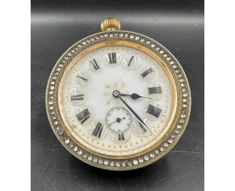 A French enamel faced ball desktop paperweight clock
