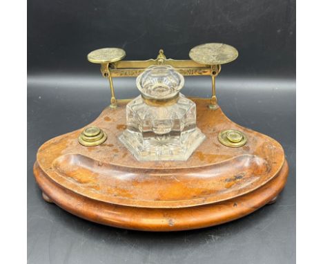 A Mahogany stand with ink well and postal scales