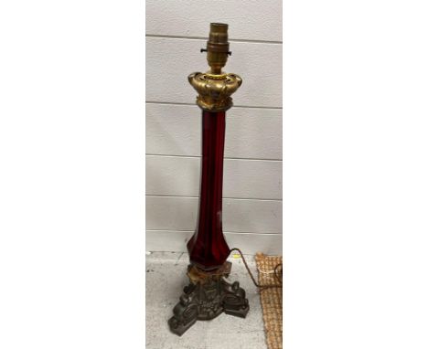 A large cranberry glass pillar lamp stand. (H 64cm)