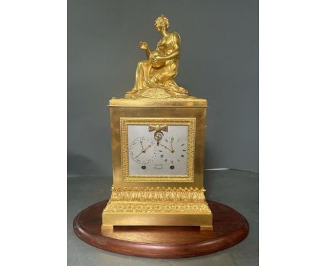 A French Empire ormolu clock with calendar dial by Brocot Gilt bronze AF