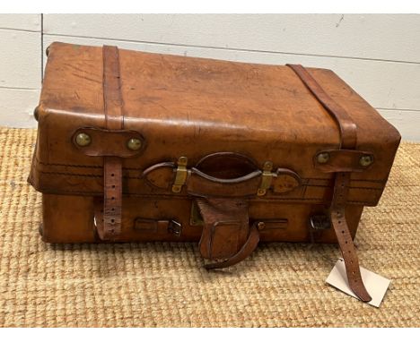 A good quality leather trunk (56cm x 23cm x 30cm)