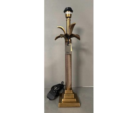 An OKA Palmero table lamp in Antique Brass.