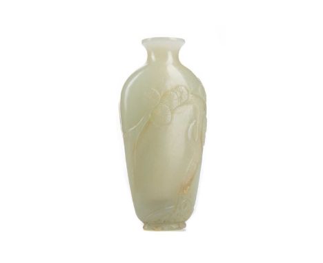 CHINESE PALE CELADON JADE SNUFF BOTTLE,of flattened tapered form, carved with a blossoming tree to one side, and a bat and ru