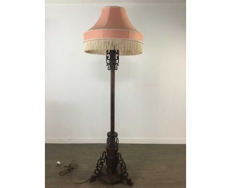 CHINESE HARDWOOD STANDARD LAMP,with carved and pierced detail on hexagonal base, 154cm high excluding fittingScrew loose or l