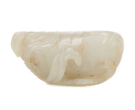 CHINESE PALE CELADON JADE BRUSH WASH,carved in the form of a lotus leaf, with further blossom growing from twisting leafy bra