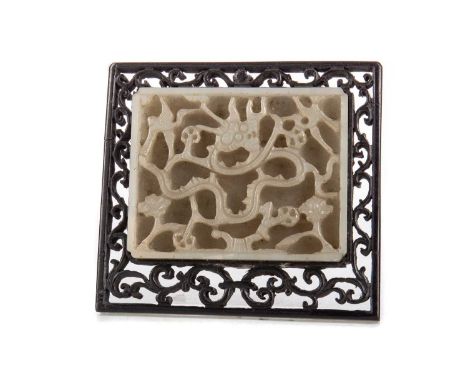 CHINESE PALE CELADON JADE CARVING,of oblong form, carved in high relief with a sprawling dragon figure surrounded by birds an