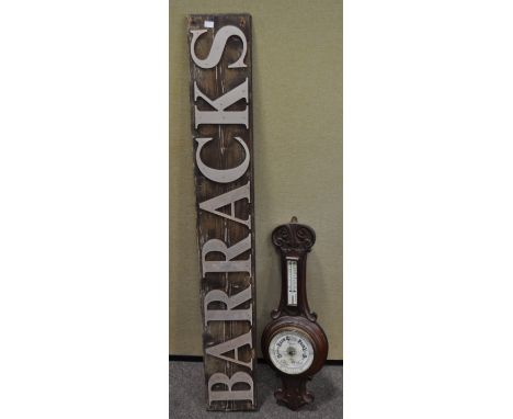 A mahogany Bristol barometer and a barracks sign