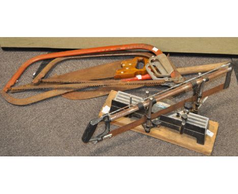 A mitre saw and various other tools
