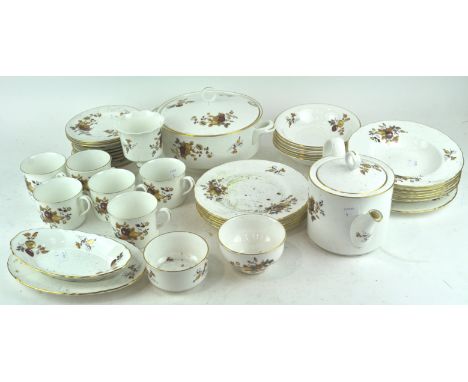 A Royal Worcester part dinner service pattern together with matching tea pot and six mugs