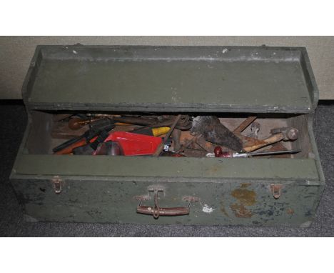 A green wooden toolbox, with tools