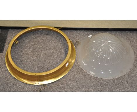 A brass and glass ceiling light