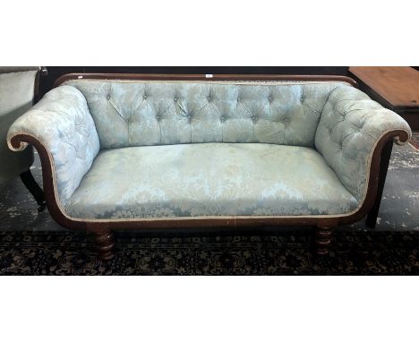 A Victorian mahogany framed button upholstered scroll arm sofa, raised on turned legs, 177 cm w x 62 cm x 79 cm h o/a (seat h