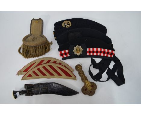 A collection of 15 various British Army forage-caps to/w a bullion epaulette and frog and two striped crescent-shaped emblazo