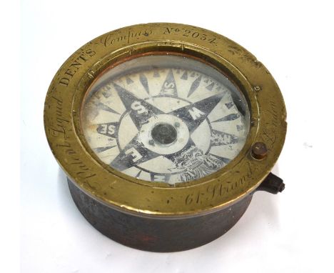 An antique Dents patent liquid boat compass No. 2034, the black and white painted dial within an engraved brass bezel and gim