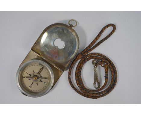 An inter-war Polish Army Officer's field-compass in electroplated outer case, stamped 'WP', Z Jeznacki, Warszawa, WZ, KM 32, 