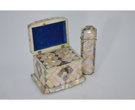 A Victorian mother of pearl and abalone shell bow front small tea caddy, the hinged cover enclosing twin lidded compartments,