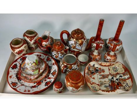 A collection of Japanese kutani ware including a circular dish with fold-over edges, 20 x 16 cm, two pairs of bottle vases 11