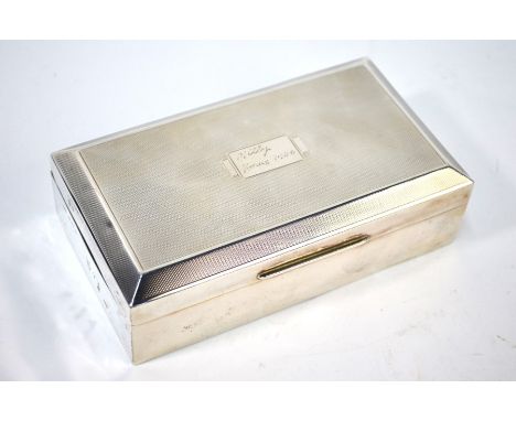 An engine-turned silver cigarette box Ernest W. Haywood, Birmingham 1945, 16 cm wide