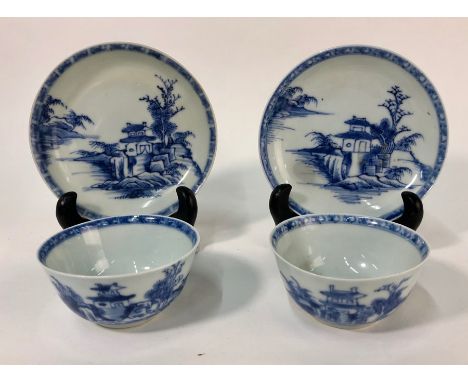 Two Chinese blue and white porcelain Nanking Cargo pagoda tea bowls and saucers, circa 1750, bears Christie's lot label 5064 