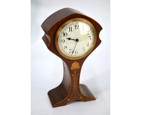 An Art Nouveau walnut tulip form mantel clock, the 8-day movement with white enamelled dial, 23.5 cm h