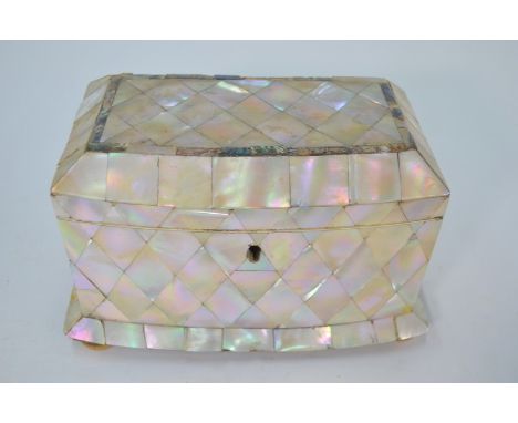 A Victorian mother of pearl tea caddy with bow front, hinged cover enclosing twin lidded compartments, 20 cm wide, on vegetab