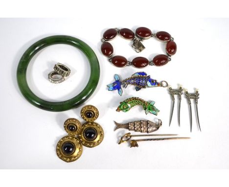 A small collection of antique and vintage jewellery including two enamelled articulated fish pendants and one in white metal,