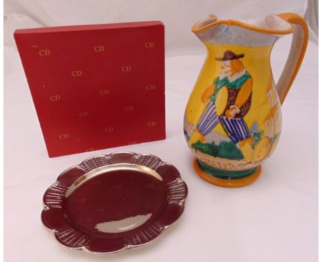 Christian Dior water jug decorated with a figure in a landscape and a Christine Dior plate in original fitted packaging, jug 