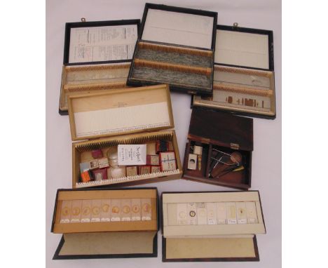 A cased quantity of pre prepared slides, a quantity of slide making equipment and tools and three empty slide boxes