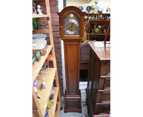 A small mahogany longcase clock,&nbsp;by Elliot, striking on eight straight gongs, 151cm high. 