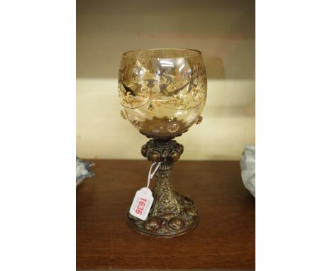 An interesting 19th century Continental glass and brass goblet,&nbsp;in the Renaissance style, decorated with stylised dragon