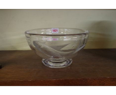 A cut glass circular bowl, finely decorated with a fish, 23cm diameter.&nbsp;&nbsp; 