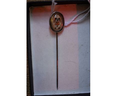 An Essex Crystal reverse intaglio novelty Yorkshire Terrier stick pin,&nbsp;the intaglio 18mm x 9mm.&nbsp; 