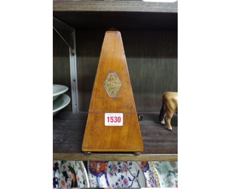 A Maelzel metronome. 