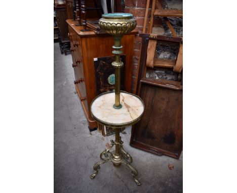 A brass and onyx tripod lamp,&nbsp;(lacking oil lamp fitting). 