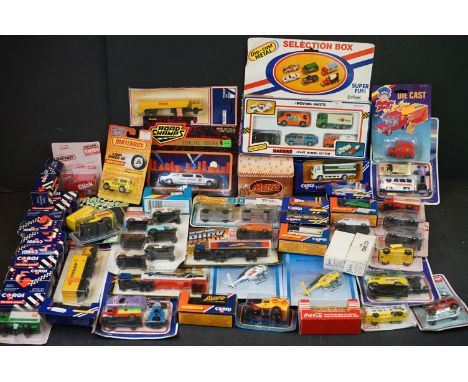 Around 50 boxed / carded diecast models from the 1980s to include Matchbox &amp; Corgi, good selection in gd condition overal