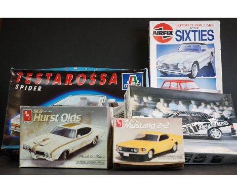 Five boxed unbuilt plastic model kits to include 2 x AMT ERTL (6898 1969 Hurst Olds, complete &amp; 6902 69' Ford Mustang 2+2