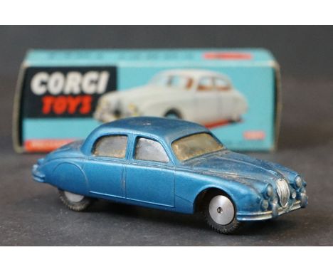 Boxed Corgi Mechanical 208M Jaguar 2.4 Litre Saloon in blue, diecast appears grubby with paint chip to roof, box vg 
