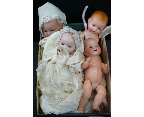 Four Early 20th century ' Armand Marseille ' Bisque Headed Baby Dolls, three approximately 23cms long and the other 32cms lon